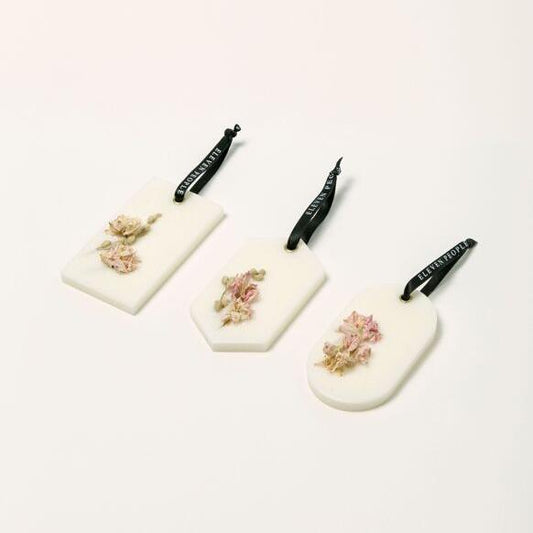 "Coffret de palets de cire parfumée – Poire, pivoine et patchouli"